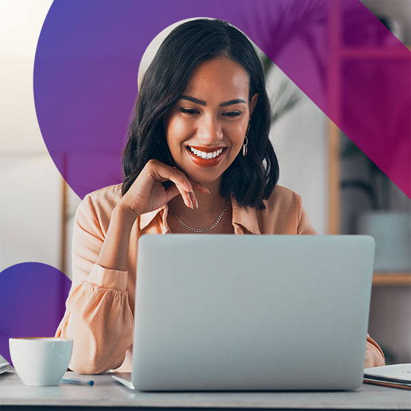 Homepage | Highlights image | Smiling female Mortgage broker at desk with laptop and coffee cup to and Mortgage Brain angled favicon clip gradient element behind